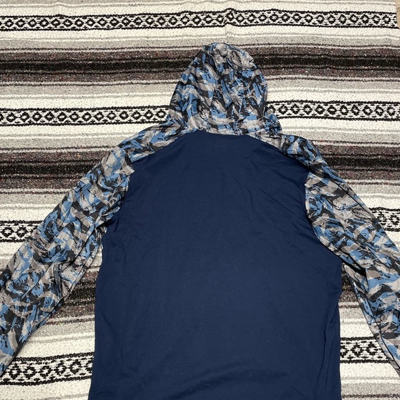 Brand new, never been worn with tags, Under Armour lightweight windbreaker. - Picture 2 of 2